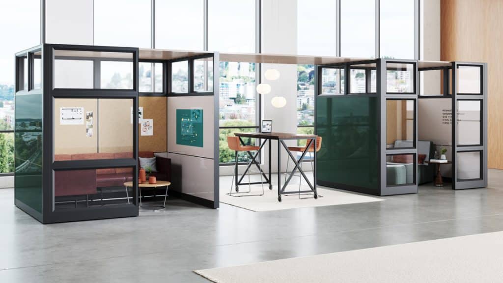 Kimball enclosed wall and office spaces, couch and table set up and chairs. Office furniture