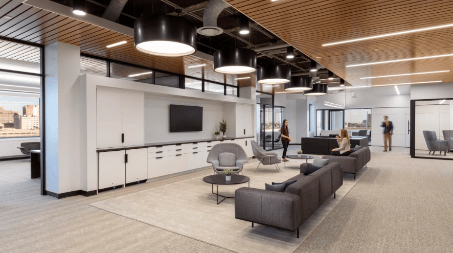 Kimball furniture, with DIRTT walls. Furniture includes couches and chairs and tables. Office furniture
